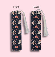 Halloween-themed bookmark with tassel on a pink background