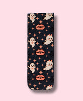bookmark with ghost and vampire lip pattern on a pink background