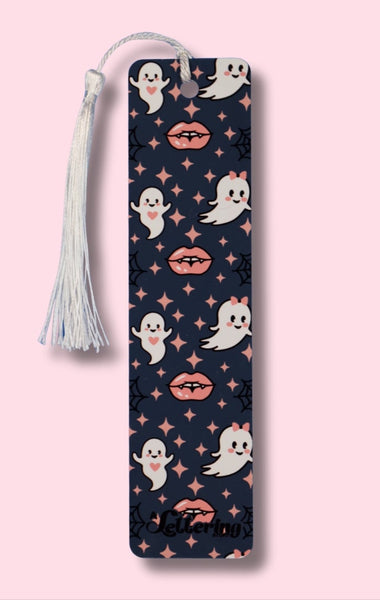 Decorative bookmark with ghost and vampire lip pattern on a pink background