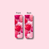 Two views of a magnetic bookmark with heart lollipops design on a pink background