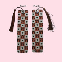 Checker Patterned with hearts and bows bookmark with tassel on a pink background