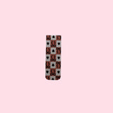 Patterned bookmark on a pink background