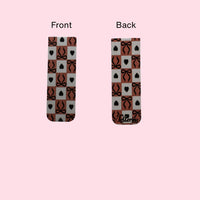Magnetic bookmark with a checkered pattern with black bows and black hearts shown from front and back on a pink background