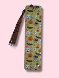 bookmark with Halloween-themed design on a pink background