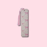 Aluminum bookmark with pink bows on a pink background