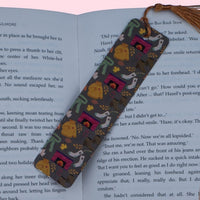 Decorative bookmark with tassel on an open book