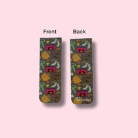 Colorful magnetic bookmark with cozy fall illustration patterns on a pink background