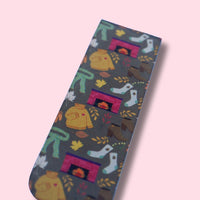 Colorful magnetic bookmark with pattern on a pink background