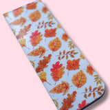 Magnetic Bookmark with autumn leaf pattern with a light blue background