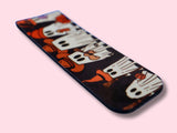 Magnetic Bookmark with cartoon ghost design on a pink background