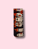 Magnetic Bookmark with a colorful ghost pattern on a pink background