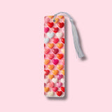 Bookmark with heart pattern on a pink background