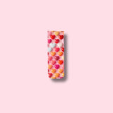 Rectangular magnetic bookmark with heart-shaped candies on a pink background