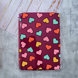 Clear Kindle Case on a magenta color kindle with colorful hearts decals