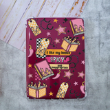 Kindle Case with different decals with Spicy Books themes, such as tags, handcuffs, books, stars, and peppers