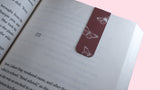 Butterfly Effect magnetic bookmark on book