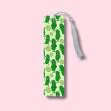 Bookmark with green pickle pattern on a pink background