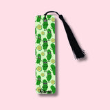 Bookmark with green pickles design on a light pink background