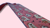 Pink bookmark with ghost pattern on a pink background