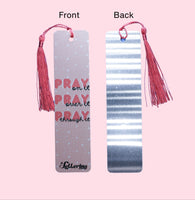 Front and back of bookmark with tassels, front showing 'PRAY on it, Pray over it, Pray throgh it' text on a pink background