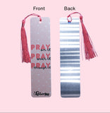 Front and back of bookmark with tassels, front showing 'PRAY on it, Pray over it, Pray throgh it' text on a pink background