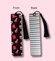 Two bookmarks, one side shows a skull pattern and the other side shows the aluminum look, on a pink background.