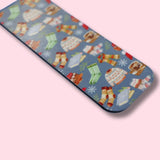 Magnetic Bookmark with winter-themed design on a pink background