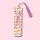 Bookmark with colorful heart pattern on a pink background
