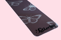 Closeup of butterflies design on bookmark